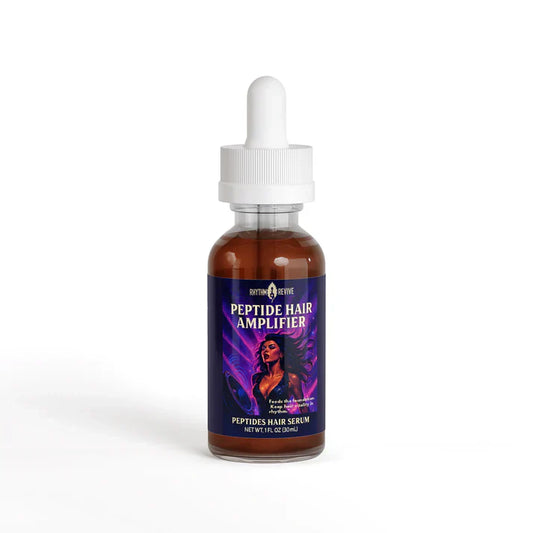 Brown glass dropper bottle labeled "PEPTIDE HAIR AMPLIFIER" from Rhythm & Revive, featuring a stylized illustration of a woman with flowing purple and pink hair; white dropper cap and bold product text emphasize its role as a peptide-based hair serum.