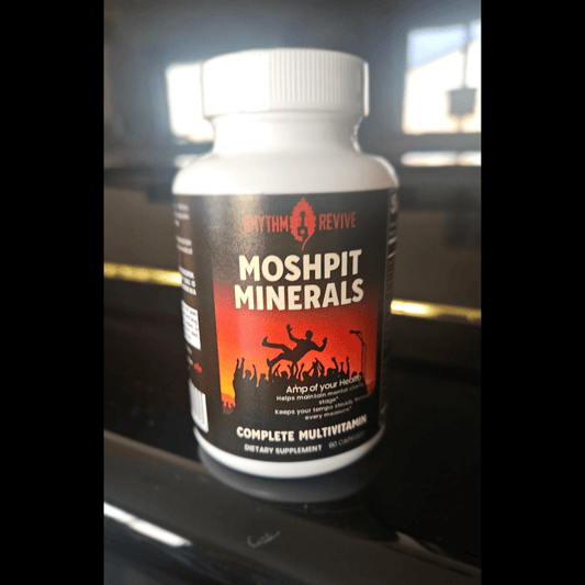 Supplement bottle labeled 'Moshpit Minerals' on a reflective surface
