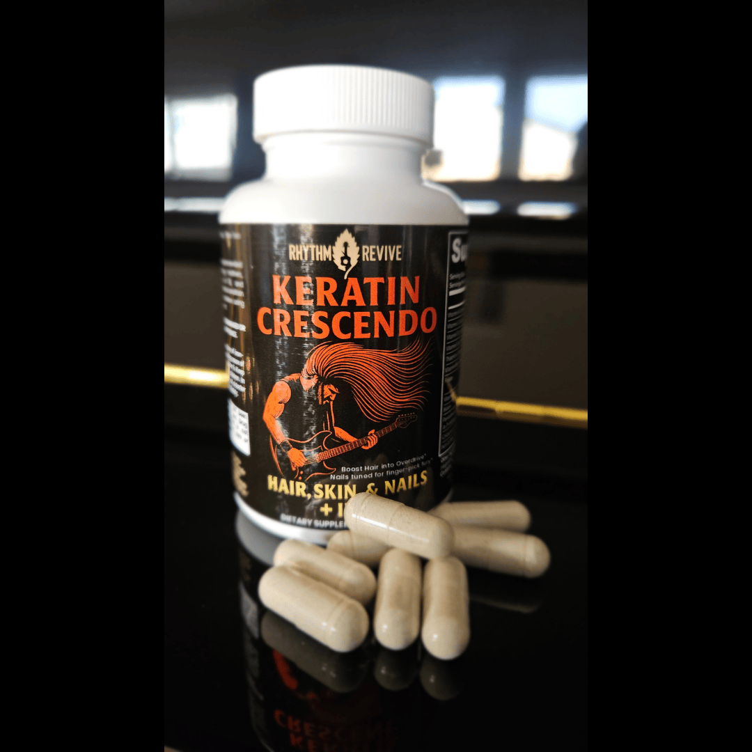 Keratin Crescendo supplement bottle with capsules on a reflective surface