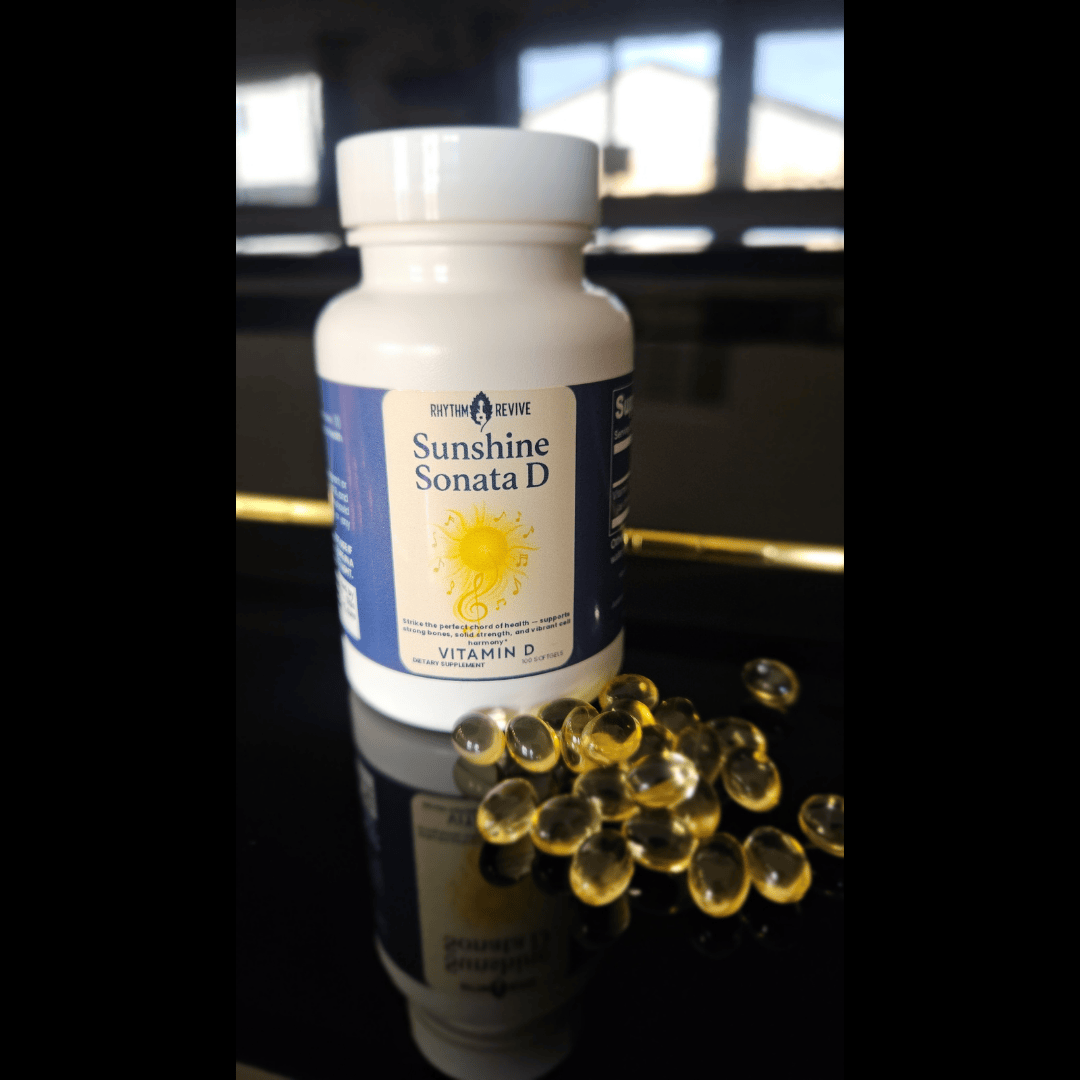 Bottle of Sunshine Sonata D vitamin D supplement with capsules on a reflective surface.